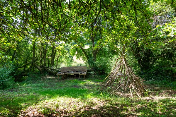mud kitchen and den building